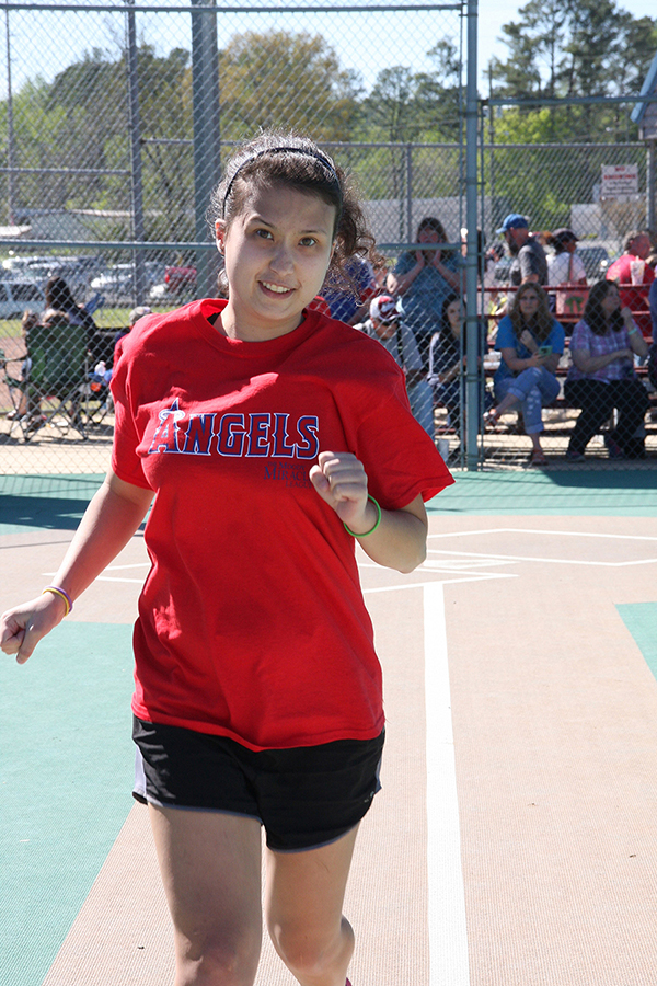 Amanda Katalikstarts down the first base line on another home run trot - Moody Miracle League