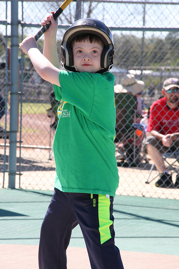 Payton Ray of the Athletics stands ready at the plate looking to hit yet another home run - Moody Miracle League